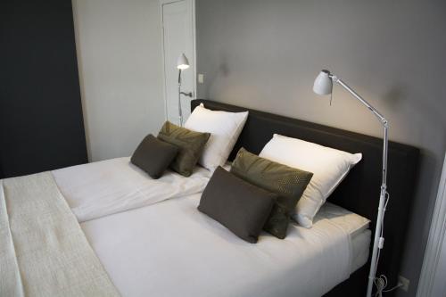 Katil atau katil-katil dalam bilik di Entre Deux Pays Apartments