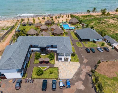 an aerial view of a house on the beach at Lemon Beach Resort in Elmina