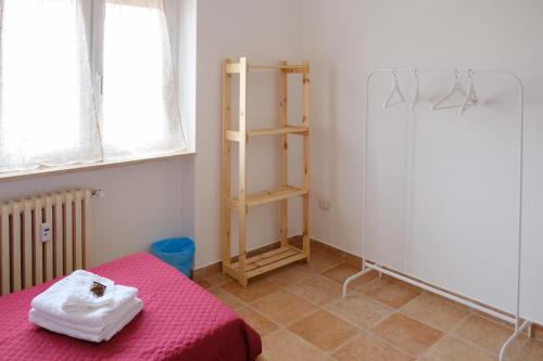 Postel nebo postele na pokoji v ubytování La casa di Dani