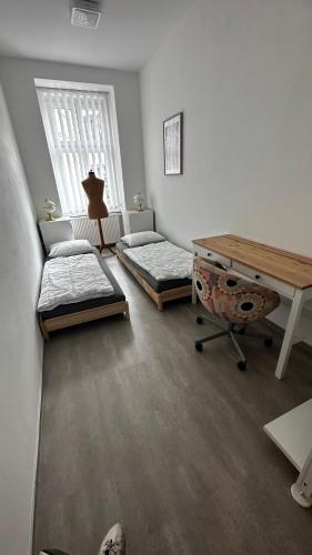 Postel nebo postele na pokoji v ubytování hbclinic apartment