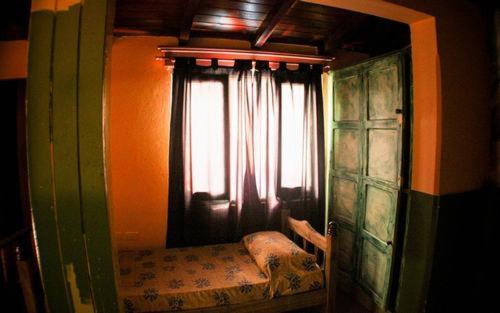 Ein Bett oder Betten in einem Zimmer der Unterkunft Hostel Trotamundos