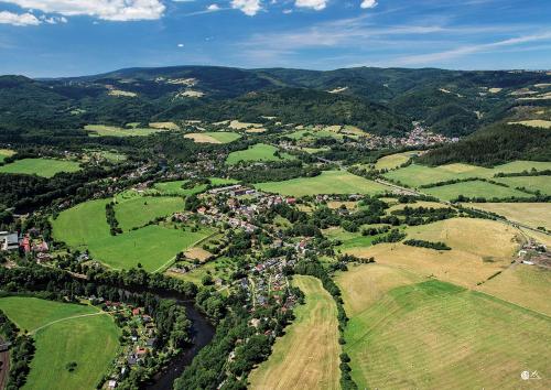 an aerial view of a village in the mountains at Formule in Pürstein