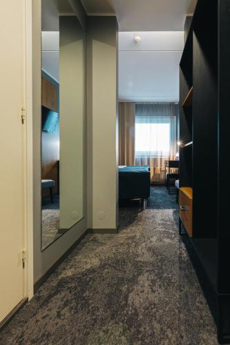 Postel nebo postele na pokoji v ubytování Go Hotel Shnelli