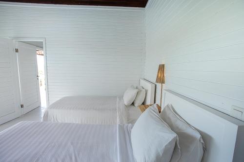 Postel nebo postele na pokoji v ubytování Stardust Villas