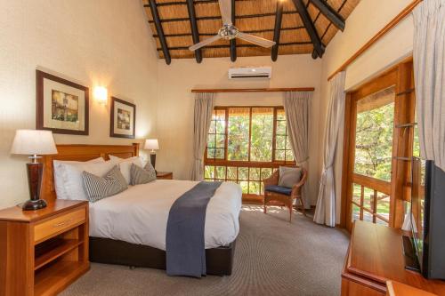 Легло или легла в стая в Kruger Park Lodge Unit No 252 with private pool