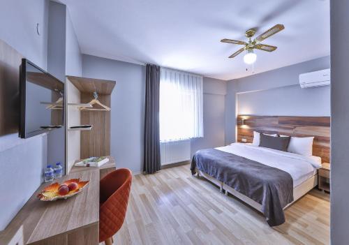 Postel nebo postele na pokoji v ubytování Palmada Hotel