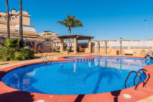 Bazén v ubytování Bungalow La Zenia cerca de la playa nebo v jeho okolí