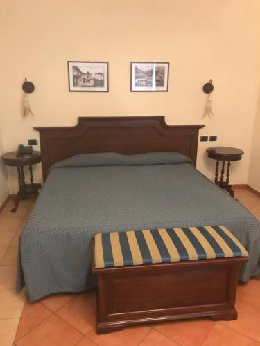 Postel nebo postele na pokoji v ubytování Hotel Barolo
