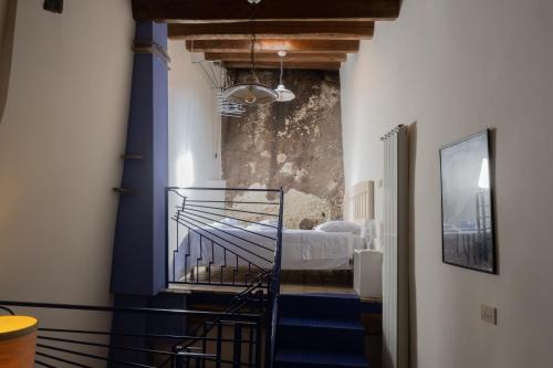 Postel nebo postele na pokoji v ubytování B&B Dimora Cigno