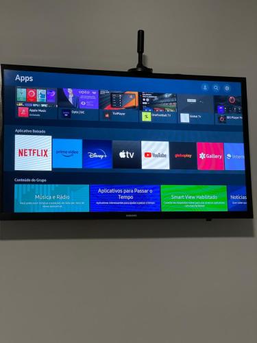 TV a/nebo společenská místnost v ubytování Morada da Ilha Pousada