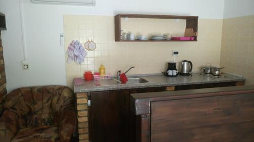 A cozinha ou kitchenette de Apartment Bartulasi