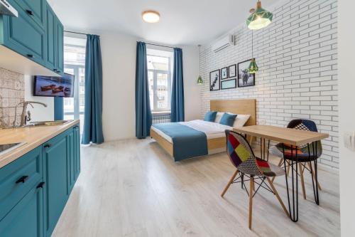 Кухня или мини-кухня в Apartments on Velyka Vasylkivska 47
