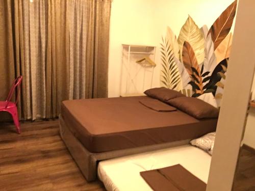 Katil atau katil-katil dalam bilik di La Reina Suite Tuscania Towers