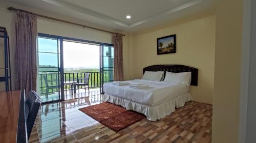 Postel nebo postele na pokoji v ubytování So View Phuket Resort