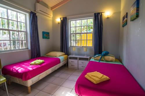 Ένα ή περισσότερα κρεβάτια σε δωμάτιο στο 26 Casa Chibi Chibi