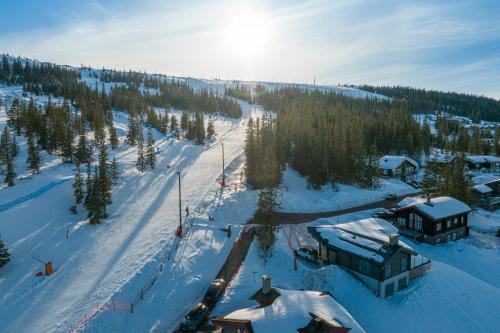 an aerial view of a ski resort in the snow at Fjällparadiset Lindvallen in Sälen