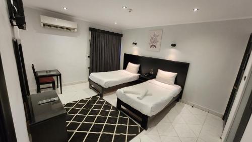 Helio Cairo Hotelにあるベッド