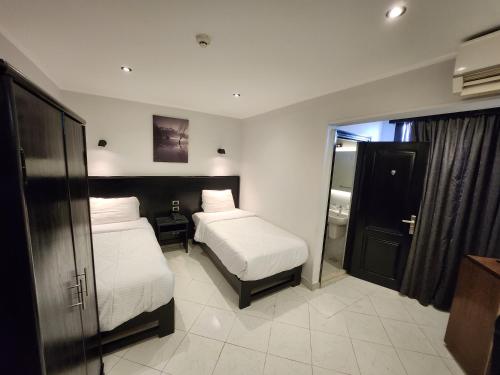 Helio Cairo Hotelにあるベッド