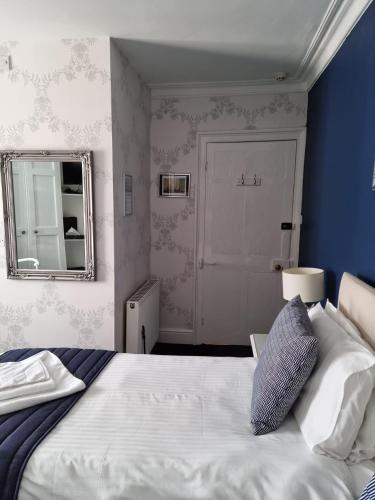 Postel nebo postele na pokoji v ubytování St Vincent Guest House