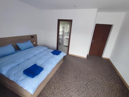 Postel nebo postele na pokoji v ubytování Casa Sturz