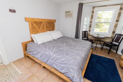 En eller flere senge i et værelse på Cache Rapids Vacation Rental