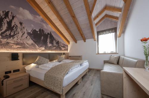 Ένα ή περισσότερα κρεβάτια σε δωμάτιο στο Hotel Canada