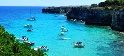 a group of boats in a large body of water at Corte Gabellone - dimora storica in Nardò