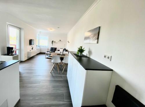 Kuchyň nebo kuchyňský kout v ubytování Terrassenhaus, FeWo 62