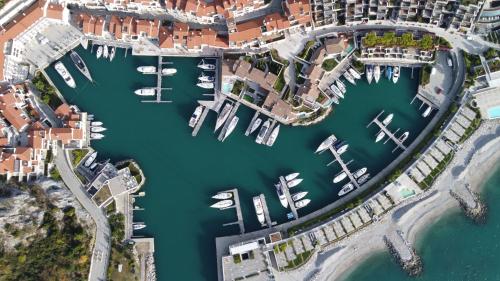 an aerial view of a marina with boats in the water at Tivoli Portopiccolo Sistiana Wellness Resort & Spa in Sistiana