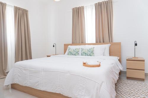 Cama o camas de una habitación en Modern Apartment in Downtown Punta Cana