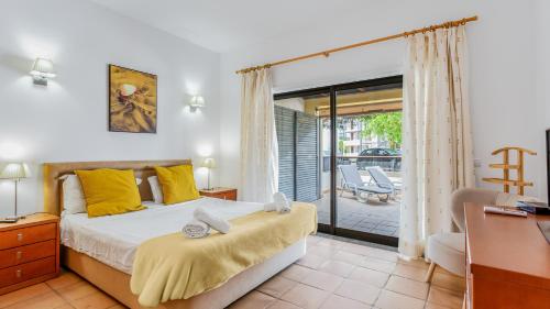 Wonderful Flat with Big Patio & Pool by LovelyStay