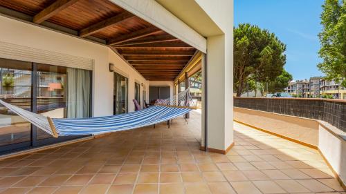 Wonderful Flat with Big Patio & Pool by LovelyStay