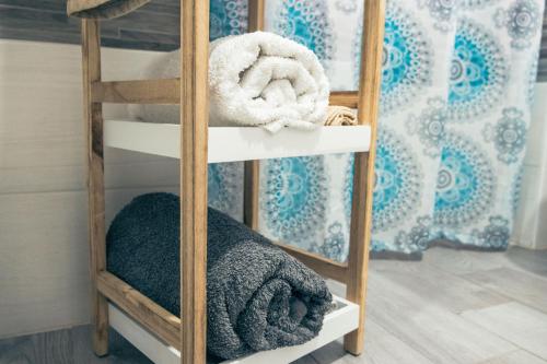 Posteľ alebo postele v izbe v ubytovaní BluMarine Appartaments