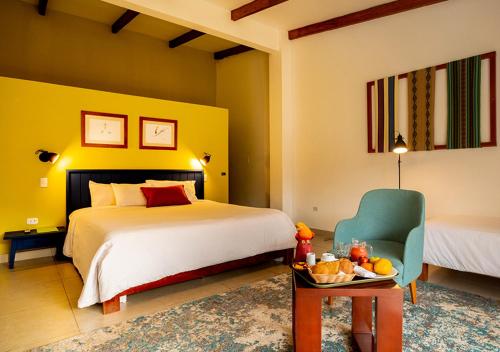 Ένα ή περισσότερα κρεβάτια σε δωμάτιο στο Gocta Andes Lodge