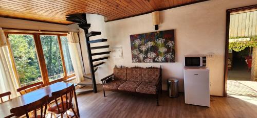 Η κουζίνα ή μικρή κουζίνα στο Hortensias Pousada Boutique - Piscina Aquecida 37 Graus e Fire Pit a Gas - Aceita PET