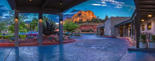 a resort with a mountain mural on the wall at Poco Diablo Resort in Sedona