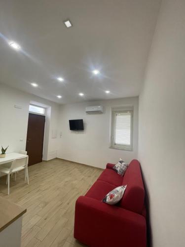 Televízia a/alebo spoločenská miestnosť v ubytovaní GM IMMOBILIARE