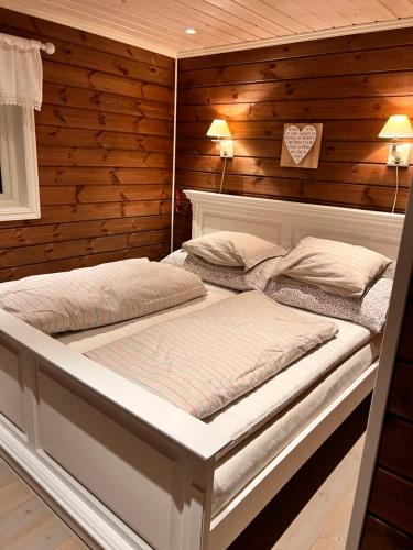 Postel nebo postele na pokoji v ubytování På solsiden av Gaustatoppen