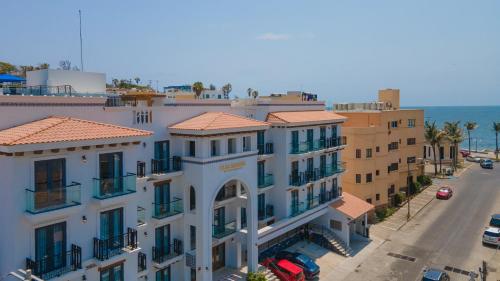 an aerial view of a building on a street at Casa Barros Vacation Condos in Mazatlán