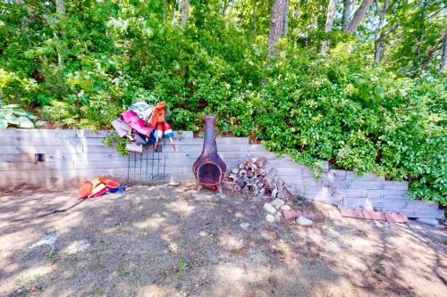 a vase sitting on a brick wall with other items at The Lakeside Landing in Plymouth