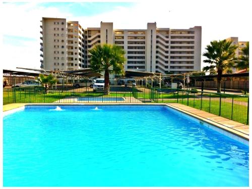 Poolen vid eller i närheten av Departamento La Serena Avenida Del Mar