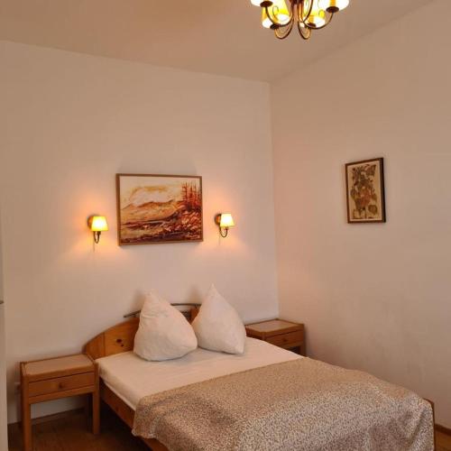 Postel nebo postele na pokoji v ubytování Villa Musik - apartments in historical Villa , Baden