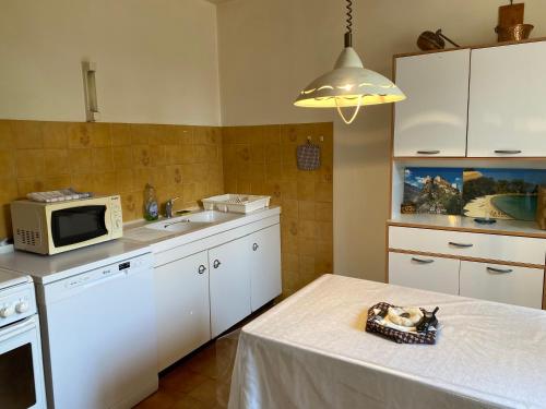 Cuisine ou kitchenette dans l'établissement Casa Minnana