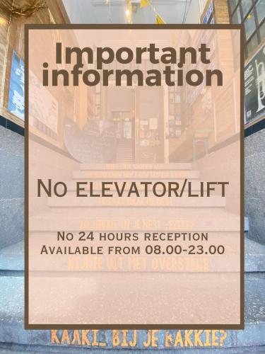 a sign in a store window that says important information at Hostel ROOM Rotterdam in Rotterdam
