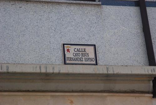 a sign on the side of a building at Apartahotel FC Catedral in León