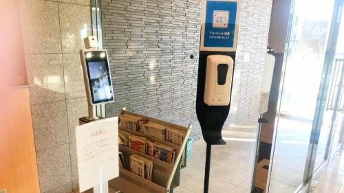 a display of a pay phone in a room at Hotel Sunrise Choshi - Vacation STAY 73479v in Choshi