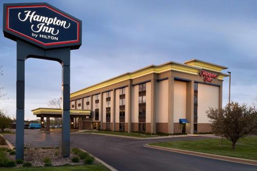 a hampton inn sign in front of a building at Hampton Inn Appleton-Fox River Mall Area in Appleton