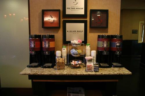a counter in a room with a group of wine bottles at Hampton Inn and Suites Austin - Lakeway in Lakeway