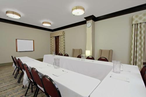 a conference room with a long table and chairs at Hampton by Hilton Austin South - I-35 & Ben White in Austin
