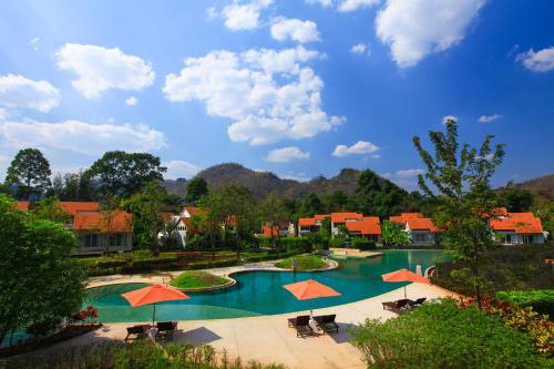 Вид на бассейн в Belle Villa Resort, Khao Yai или окрестностях